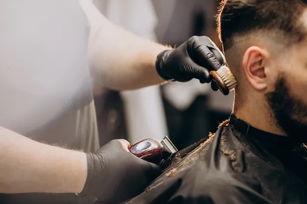 client-doing-hair-cut-barber-shop-salon